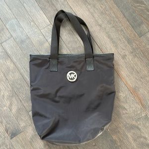 Michael Kors canvas md tote reversible black. Never worn